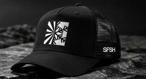 05_black_trucker_cap_CONCEPT.jpg Concept mockup of a black mesh trucker cap with SFSH branding.